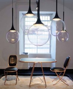 Slovenian designer Nika Zupanc's “Bubble” lamp, made of a delicate handblown pink glass produced by Vistosi in the tradition of Murano glass.